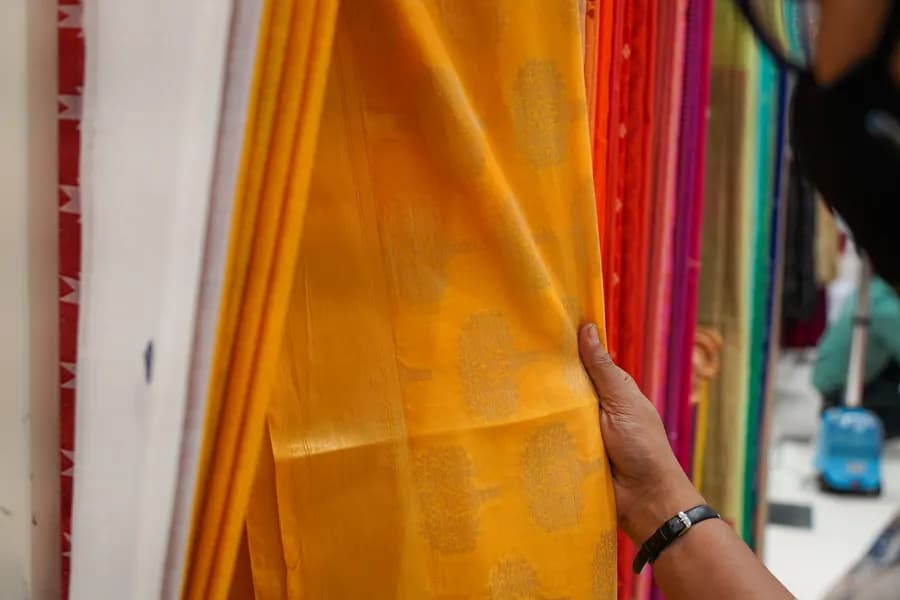 Hand-woven Santipuri cotton saree at a textile market